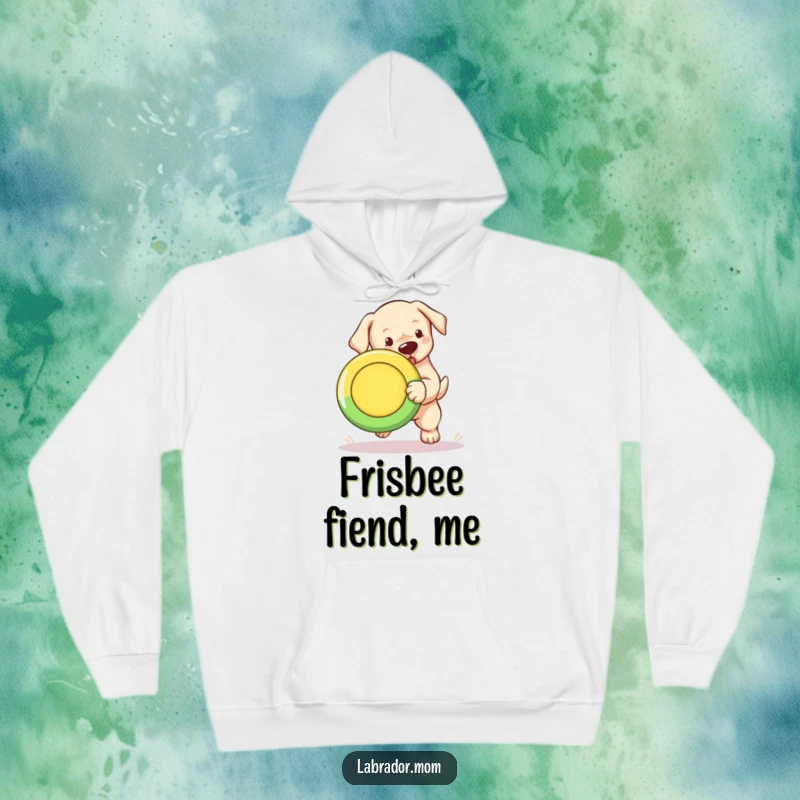 Funny Labrador puppy hoodie with a cute cub joyfully fetching a brightly colored Frisbee.