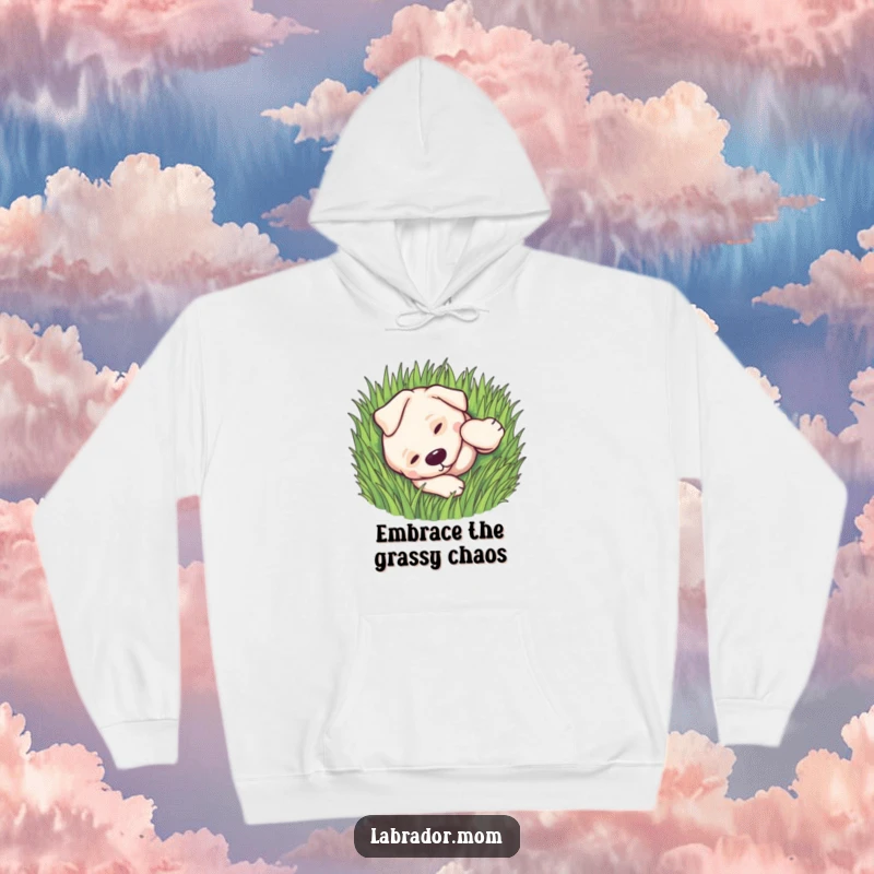 Funny kawaii Labrador dog in a warm hoodie, rolling playfully in green grass, cozy and joyful.