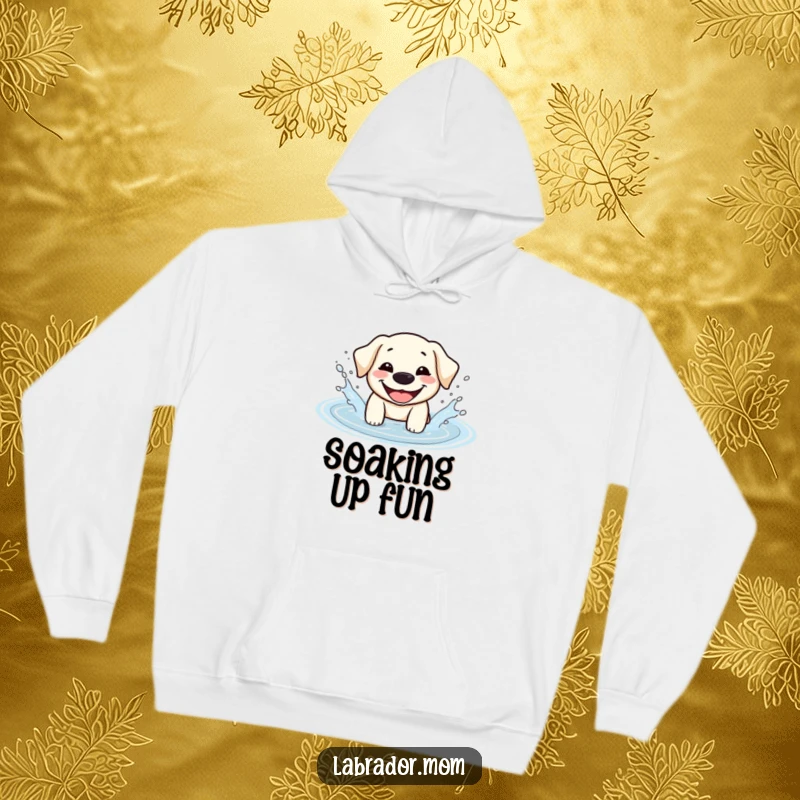 Funny Kawaii Labrador hoodie capturing a happy dog splashing enthusiastically in a puddle, radiating warmth and playful energy.