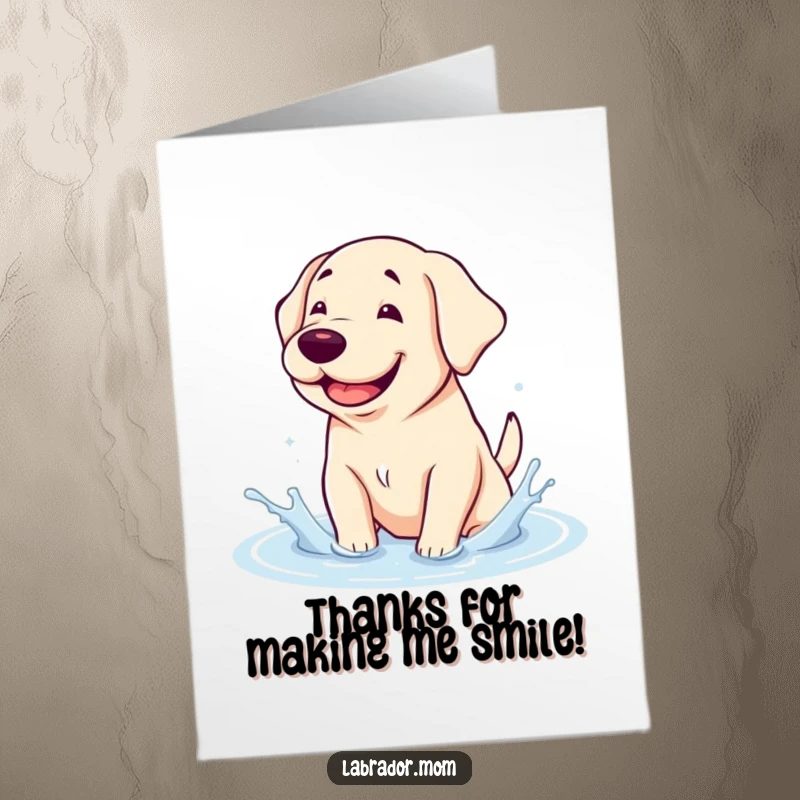 Funny free printable thank you card: Adorable kawaii labrador with a goofy grin splashes happily in a puddle, saying thanks.