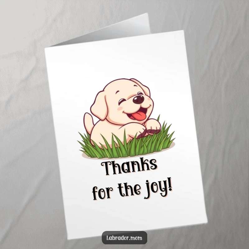 Funny Free Printable Playful Lab Thank You Card: Kawaii labrador rolling playfully in lush green grass, conveying thanks.